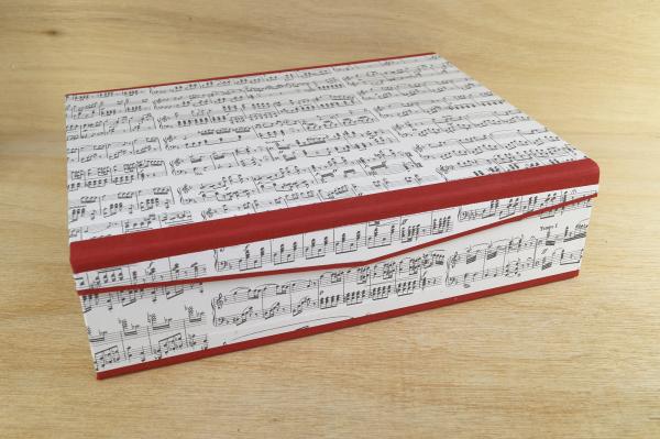 Large sheet music box with red edges